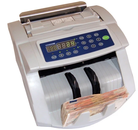 Een elektronische biljetten-teller als voorbeeld van apparatuur voor geldverwerking. Foto: AppleMan1, CC BY-SA 2.5.